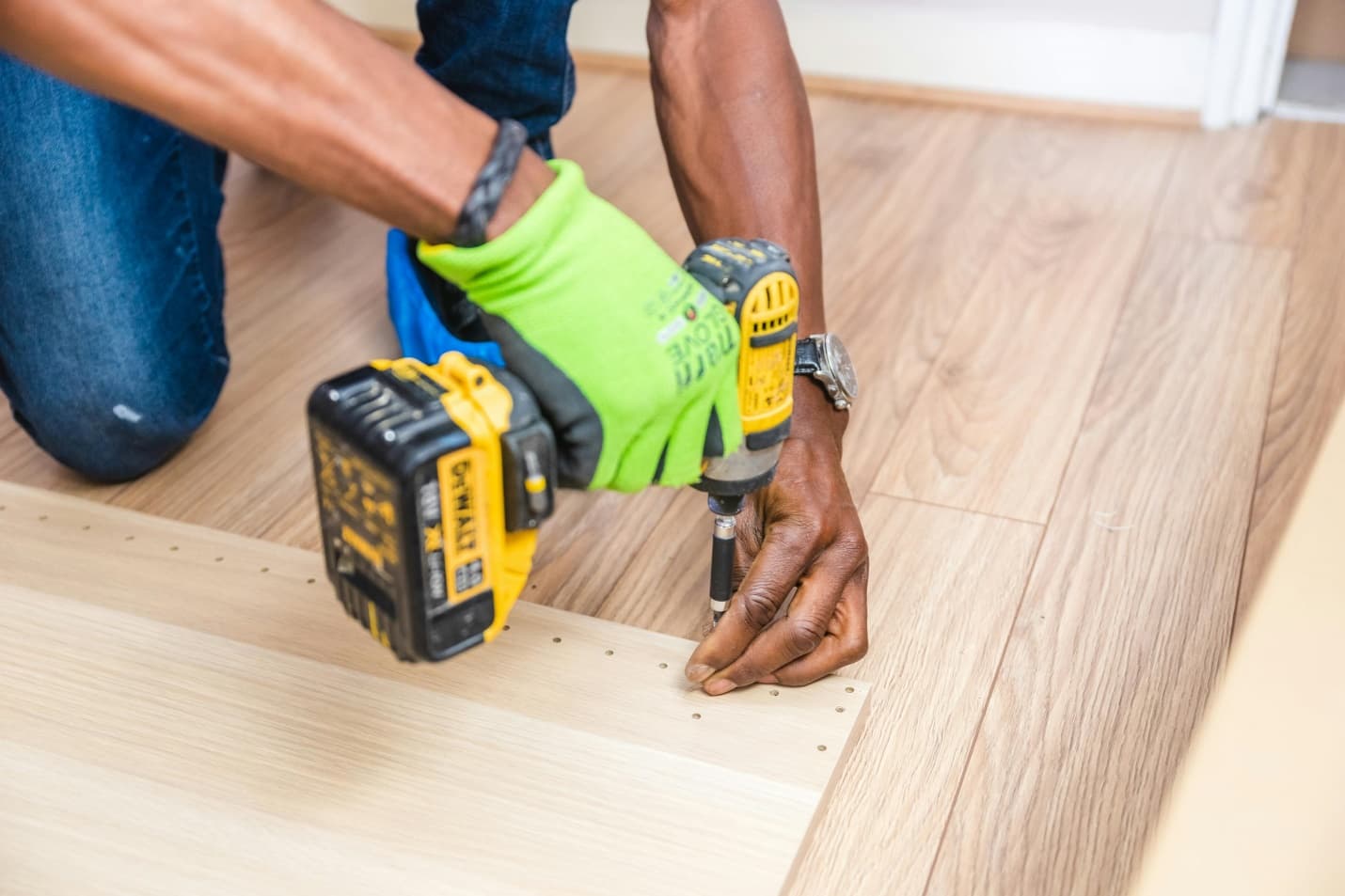 man using a cordless drill