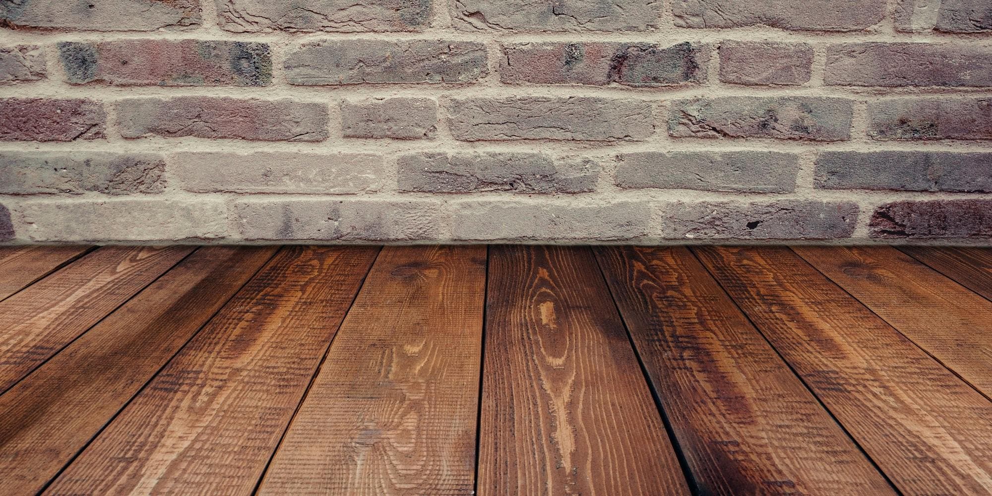 wood floor with brick wall