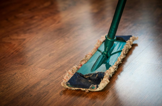 person cleaning the floor