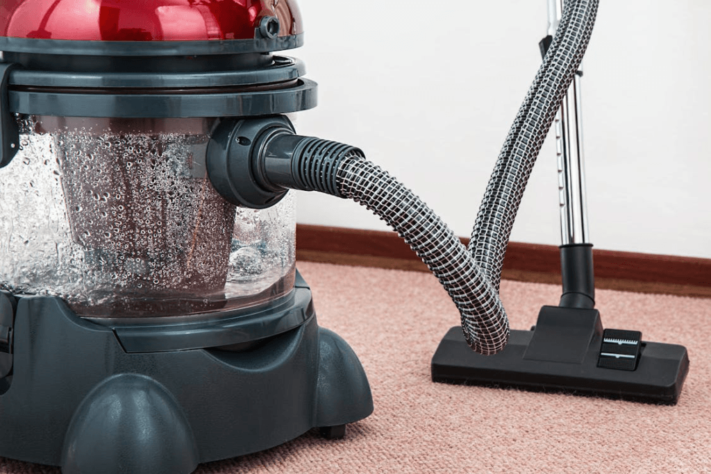  A large vacuuming machine cleaning carpet