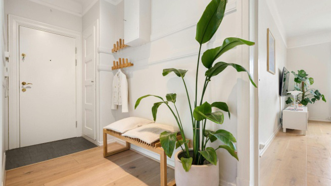Entryway featuring durable vinyl flooring with a sleek, modern aesthetic, installed by experts.