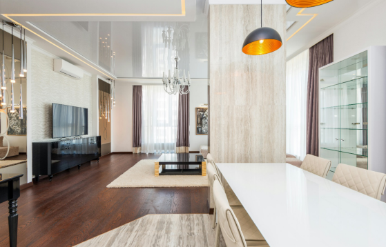 fancy design interior of a room with wood flooring and chandeliers